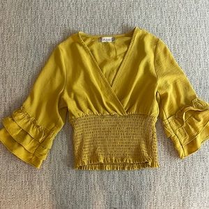 Beautiful yellow top.